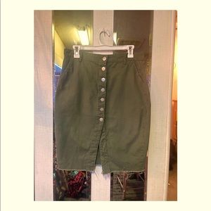 cute dark green tight skirt! not loose. size large, good condition!